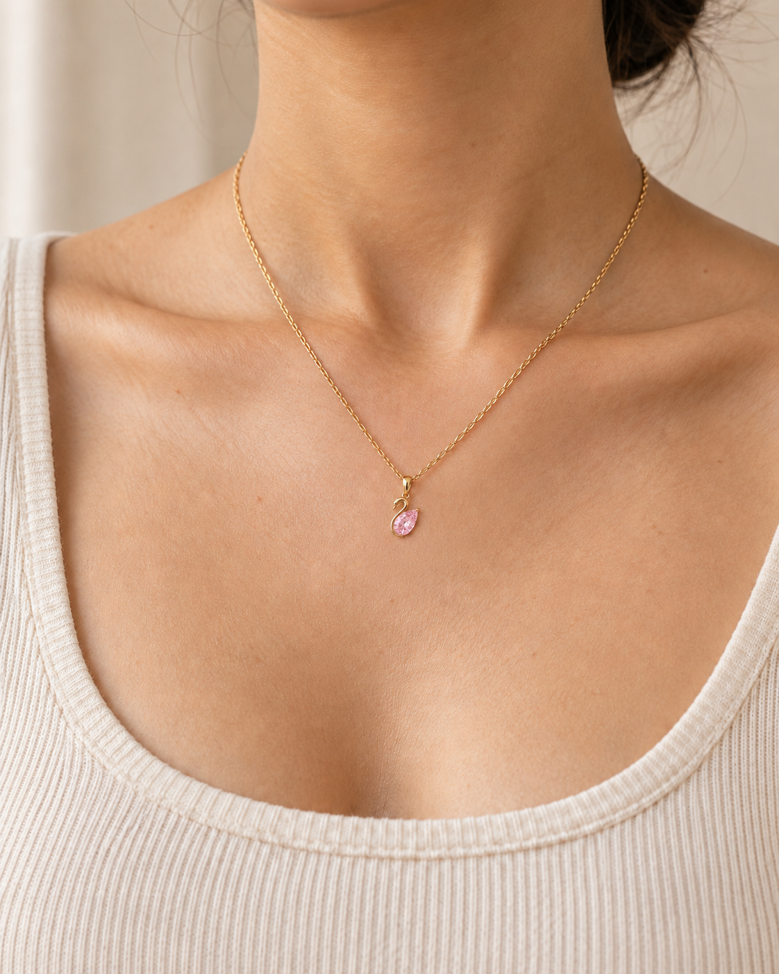 Close-up of the Natural rose quartz and its setting in Rose Quartz Swan Pendant