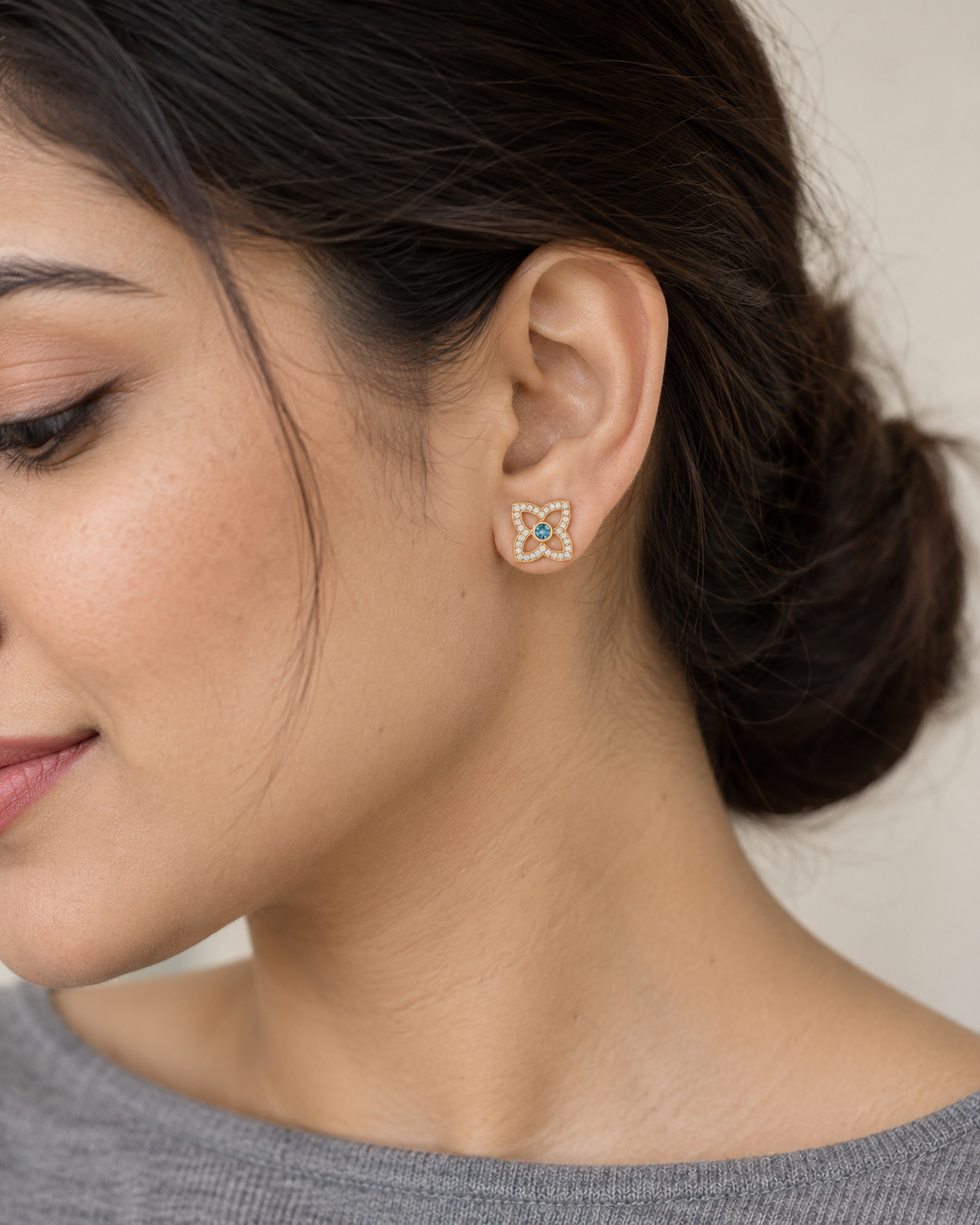 Close-up of the Natural blue topaz and its setting in Blue Topaz Clover Pave Studs