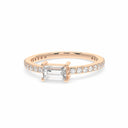 Bold baguette cut diamond centre stone ring with diamonds