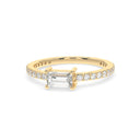 Bold baguette cut diamond centre stone ring with diamonds