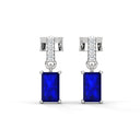 Bold baguette cut sapphire centre stone drop earrings with diamonds