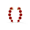 Love floating ruby curve climber earrings