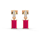 Bold baguette cut ruby centre stone drop earrings