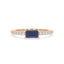 Bold baguette cut sapphire centre stone ring with diamonds