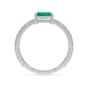 Bold baguette cut emerald centre stone ring