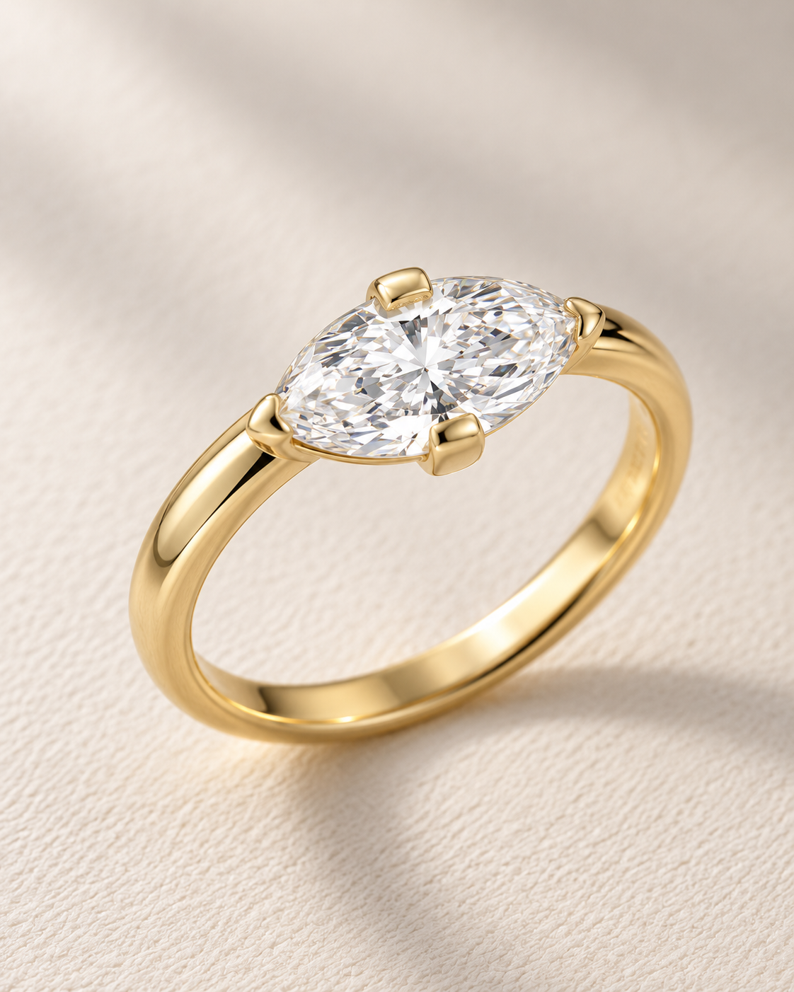 Close-up of Lab Grown Diamond Marquise Solitaire Ring, showing the gold finish over sterling silver