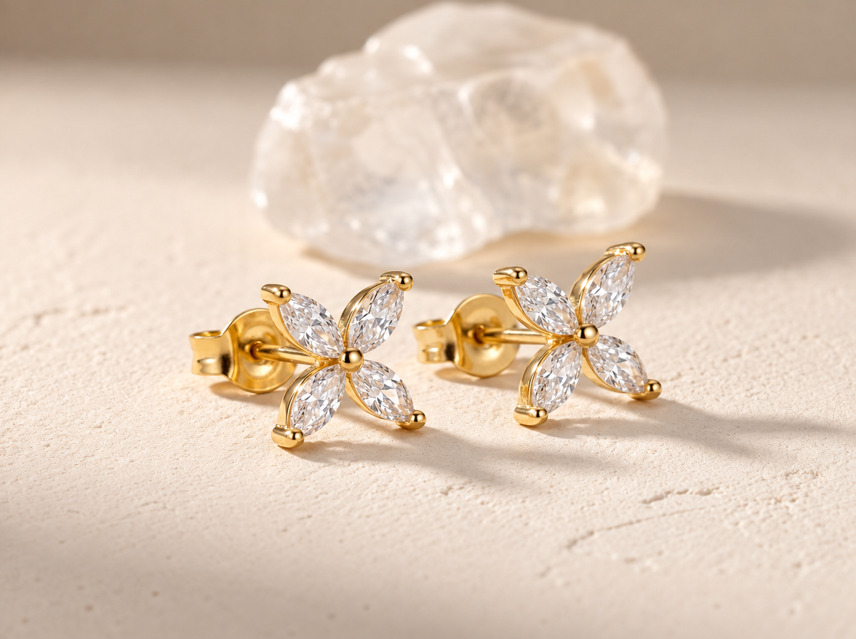 Close-up of Lab Grown Diamond Butterfly Studs, showing the gold finish over sterling silver