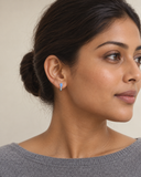 Blue Topaz Pear Drop Huggies — Carat Hills