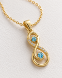 Blue Topaz Infinity Pave Pendant — Carat Hills