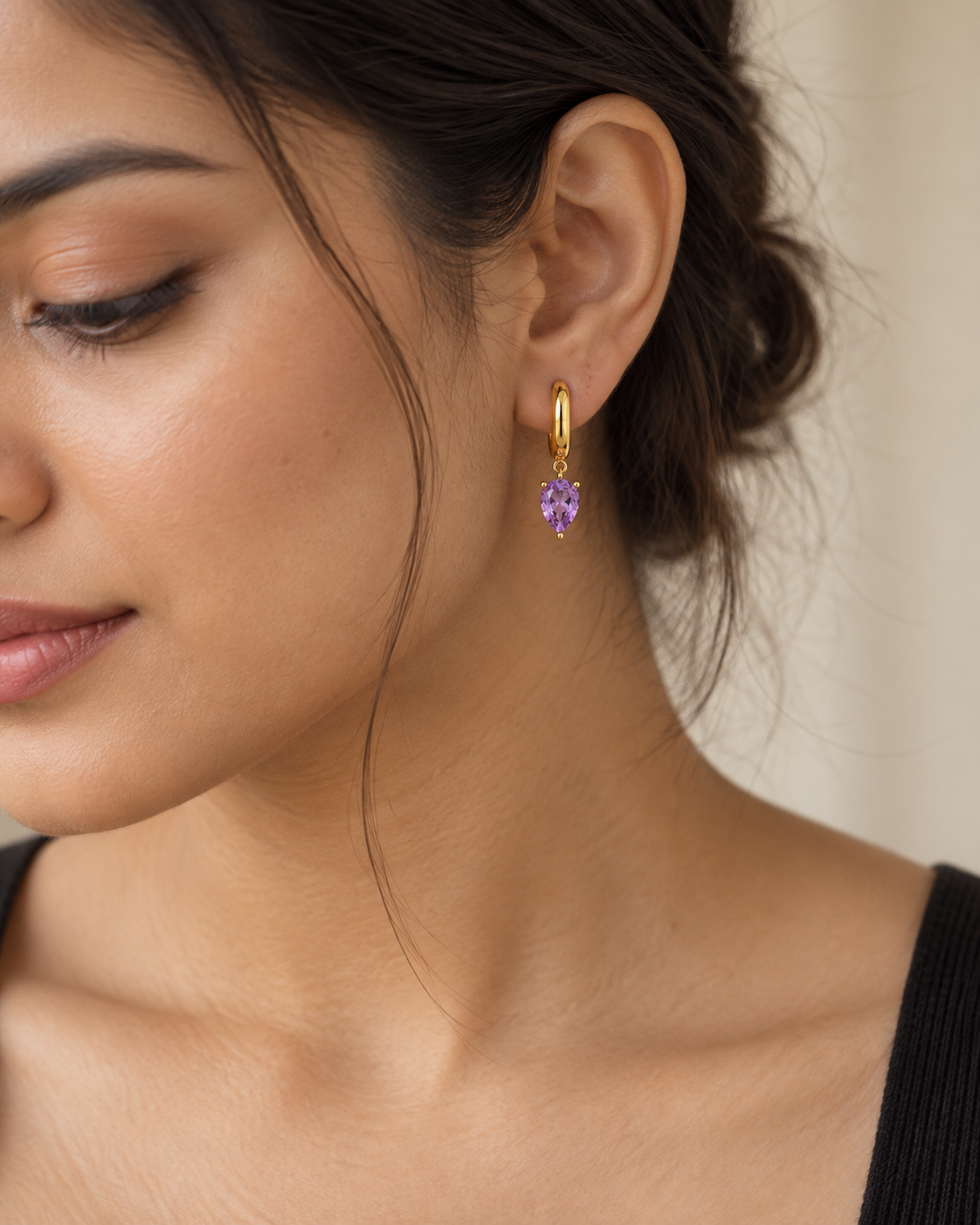 Close-up of the Natural amethyst and its setting in Amethyst Pear Drop Charm Hoops
