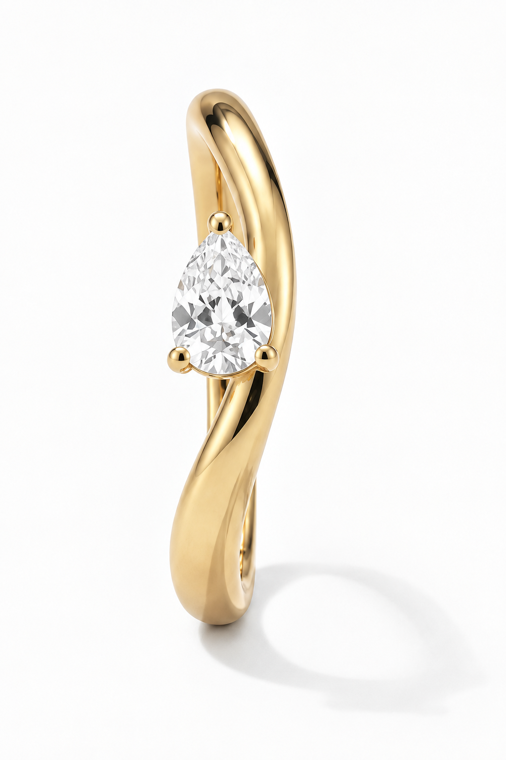 Close-up of Lab Grown Diamond Pear Twist Ring, showing the gold finish over sterling silver