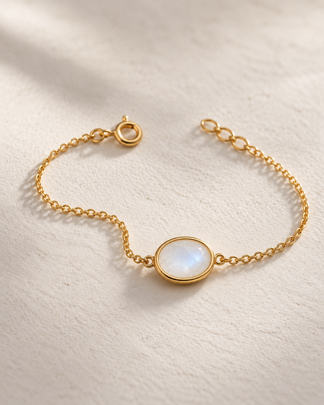Close-up of Moonstone Oval Bezel Bracelet, showing the gold finish over sterling silver