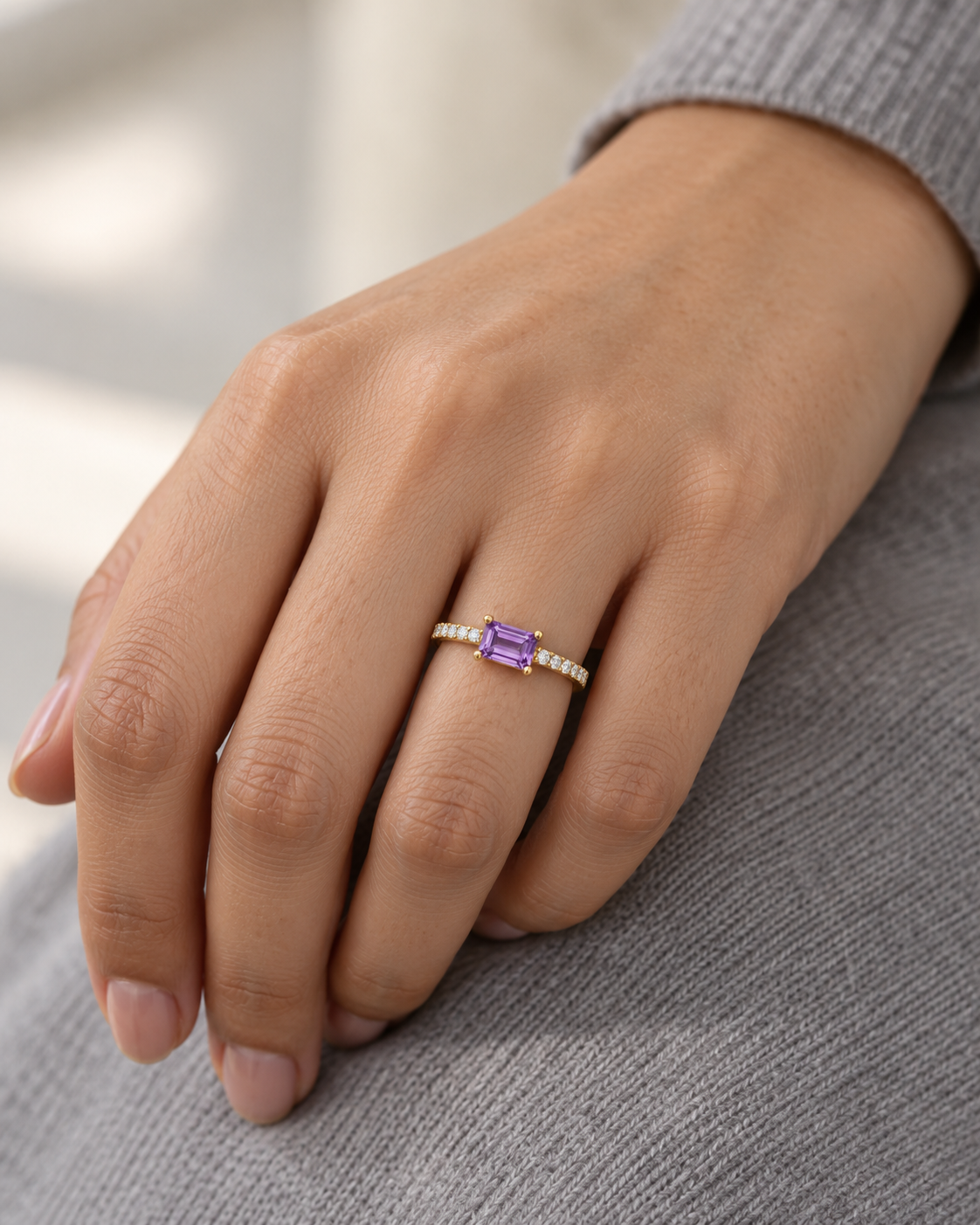 Close-up of the Natural amethyst and its setting in Amethyst Baguette Eternity Ring