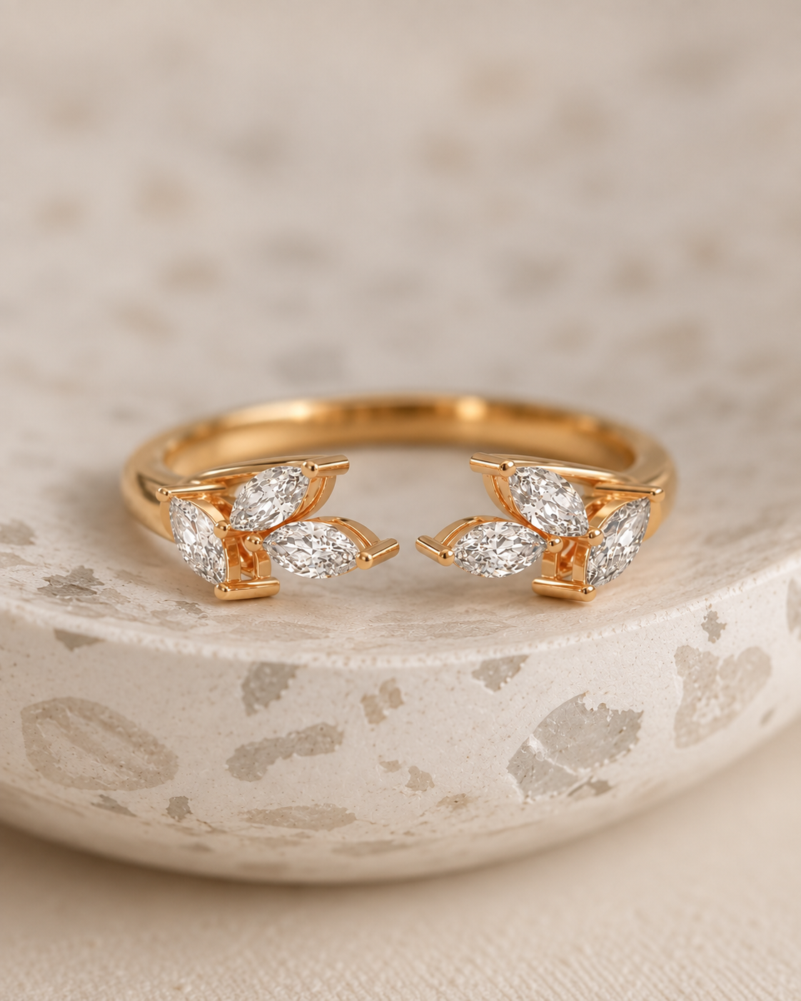 Close-up of Lab Grown Diamond Marquise Bar Ring, showing the gold finish over sterling silver