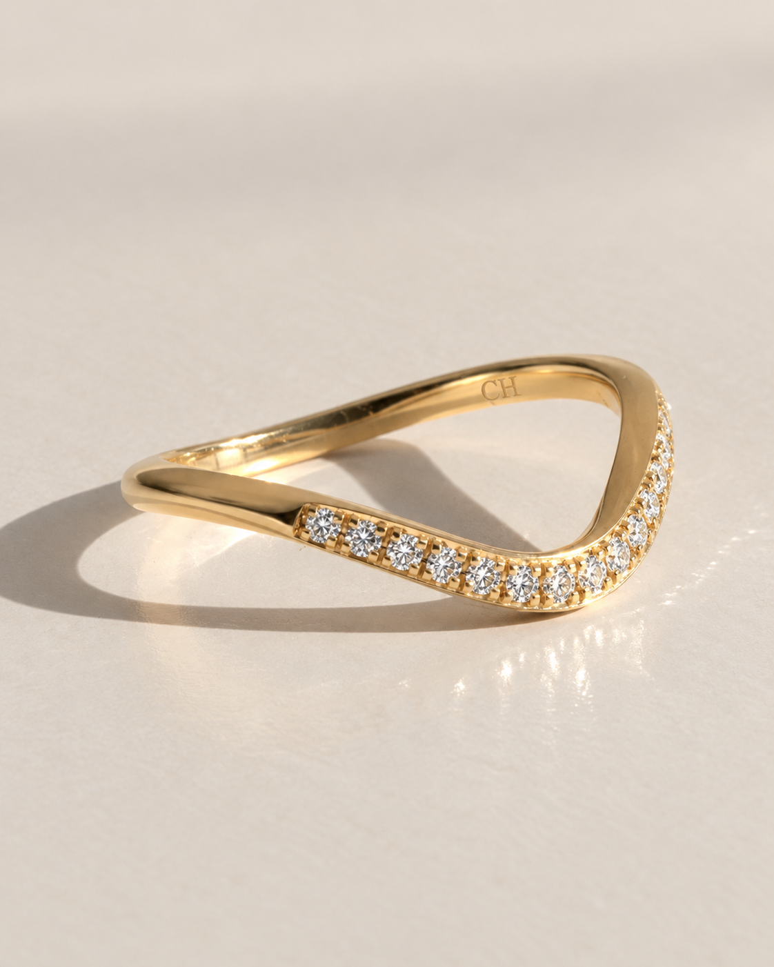 Close-up of Lab Grown Diamond Curve Pave Ring, showing the gold finish over sterling silver