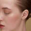 Power hamsa stud earrings diamond