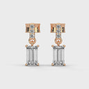 Bold baguette cut diamond centre stone drop earrings
